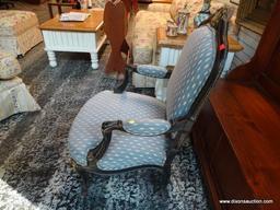 (R1) MAHOGANY AND BLUE UPHOLSTERED ARM CHAIR WITH UPHOLSTERED SEAT, BACK, AND ARMS. HAS A GOLD