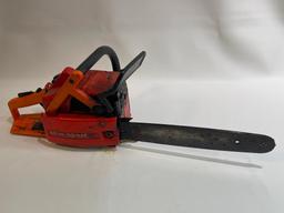 (S12L) VINTAGE SACHS DOLMAR WEST GERMANY CHAIN SAW 14 INCH BAR 2.0 CU IN. MOTOR IS NOT LOCKED UP.