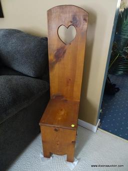 (LR) PINE WOODEN CHAIR WITH CUT OUT HEART- 11 IN X 13 IN X 48 IN, ITEM IS SOLD AS IS WHERE IS WITH