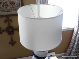 (LR) BLUE AND WHITE STRIPED DECORATIVE GLASS LAMP- WITH SHADE- 26 IN H, ITEM IS SOLD AS IS WHERE IS