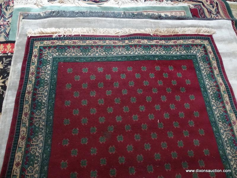 MACHINE MADE ORIENTAL STYLE IN BURGUNDY, GREEN, AND BEIGE. MEASURES APPROXIMATELY 5 FT 4 IN X 7 FT 8