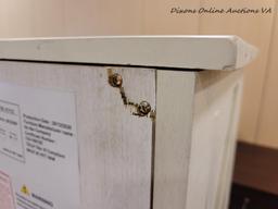 (R3) A-AMERICA SUN VALLEY BARN DOOR CHEST WITH A WHITE FINISH. #SUVWT5630. THE SUN VALLEY WHITE