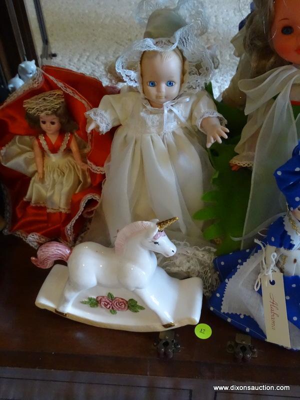 (FR) SHELF LOT TO INCLUDE: PORCELAIN ROCKING HORSE, (6) MISC. DOLLS, (1) MADE IN HOLLAND DOLL,