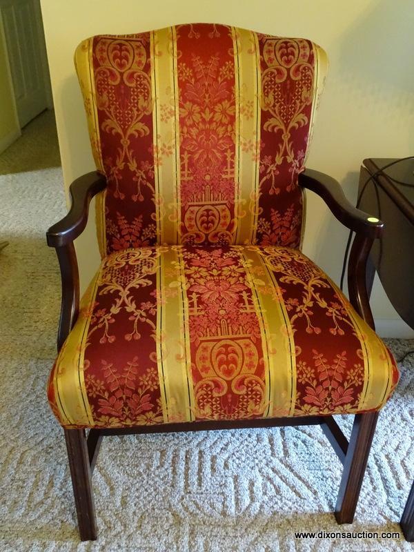 (FR) UPHOLSTERED ARM CHAIR WITH TONES OF RED, GOLD & CREAM COLORS. MEASURES APPROX. 23" X 21" X 36"