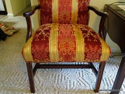 (FR) UPHOLSTERED ARM CHAIR WITH TONES OF RED, GOLD & CREAM COLORS. MEASURES APPROX. 23" X 21" X 36"