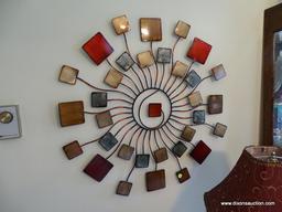 (FR) DECORATIVE WALL ART. CIRCULAR PATTERN WITH MULTI-COLORED SQUARE ADORNMENTS. MEASURES APPROX.