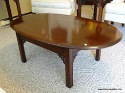 (FR) OVAL COFFEE TABLE WITH REEDED LEGS. MEASURES 43-1/2" X 27-1/2" X 16"T.