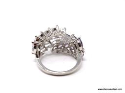 .925 STERLING SILVER LADIES 5 CT COCKTAIL RING. SIZE 8. ITEM IS SOLD AS IS WHERE IS WITH NO