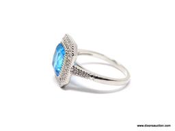 .925 STERLING SILVER LADIES 2-1/2 CT BLUE TOPAZ RING. SIZE 8. ITEM IS SOLD AS IS WHERE IS WITH NO