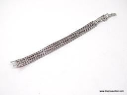 .925 STERLING SILVER LADIES 19 CT GARNET BRACELET. ITEM IS SOLD AS IS WHERE IS WITH NO GUARANTEES OR