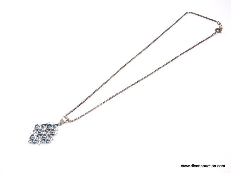 .925 STERLING SILVER LADIES 4 CT BLUE TOPAZ PENDANT WITH 16" CHAIN. ITEM IS SOLD AS IS WHERE IS WITH