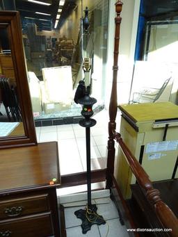 (R1) BRONZE TONED FLOOR LAMP WITH HARP AND FINIAL. MEASURES 66.5 IN TALL. ITEM IS SOLD AS IS WHERE