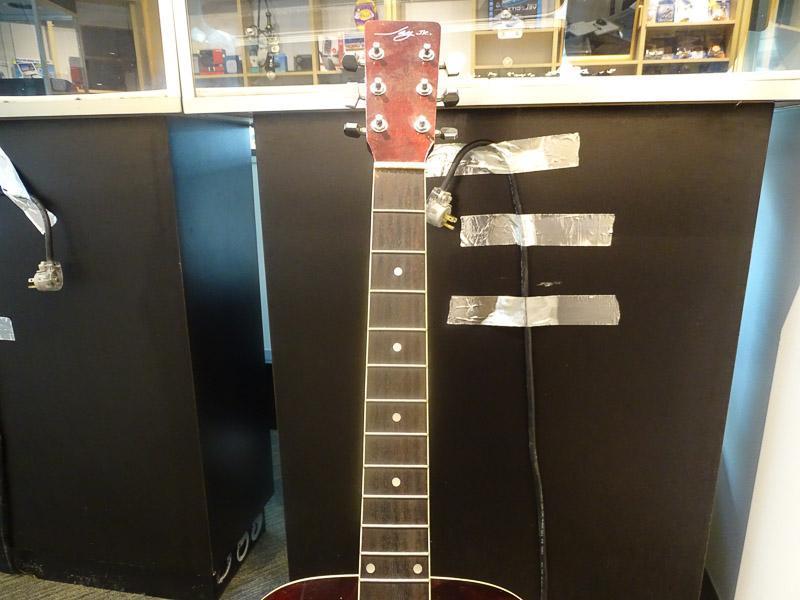 (SC) JAY JR. ACOUSTIC ELECTRIC GUITAR. NEEDS STRINGS, PEGS, AND LOWER TENSION BAR. MODEL