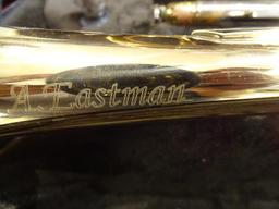 (SC) A. EASTMAN TRUMPET WITH CLEANING CLOTH AND LIQUID, AND A HARD CASE. HAS MOUTHPIECE. ITEM IS
