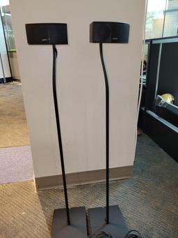 (SC) PAIR OF BOSE SIDE SPEAKERS ON STANDS. EACH MEASURES 38 IN TALL. ITEM IS SOLD AS IS WHERE IS