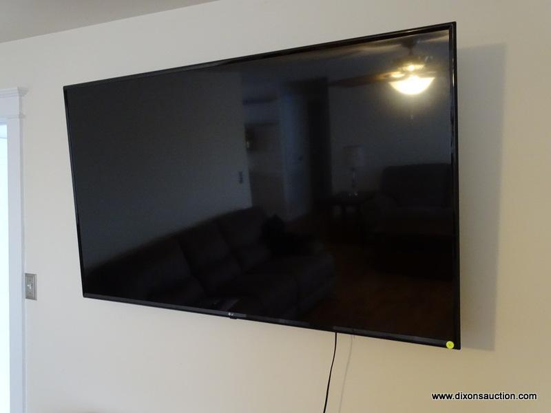 (LR) LG 64 IN FLAT SCREEN TV- MODEL- 65UK6090PUA, HAS ORIGINAL LEGS REMOTE AND MANUAL- WALL MOUNT