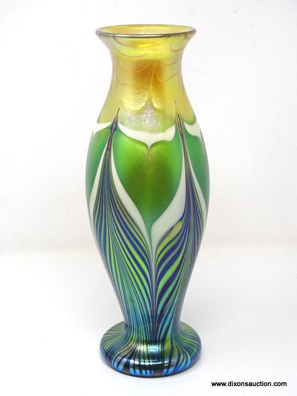 Tiffany vase, pulled and feathered in green gold and white. 10" in height. Signed and numbered 2932J