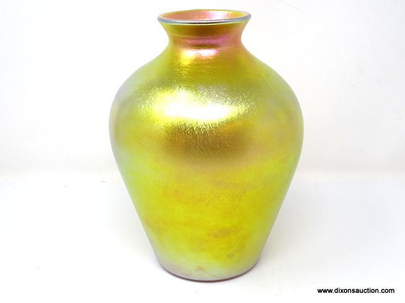 An amphora shaped, gold iridescent vase having an unfired silver painted rim. 8 1/8" in height.
