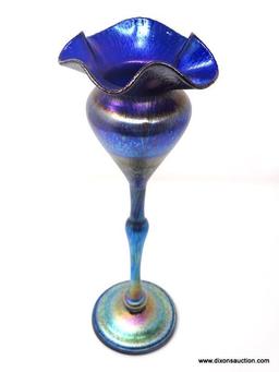 Tiffany style flower form vase. Tanzanite colored, stretched petals, with blue, gold & purple