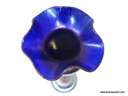 Tiffany style flower form vase. Tanzanite colored, stretched petals, with blue, gold & purple