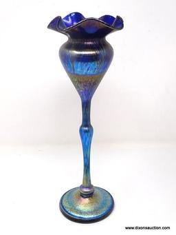 Tiffany style flower form vase. Tanzanite colored, stretched petals, with blue, gold & purple