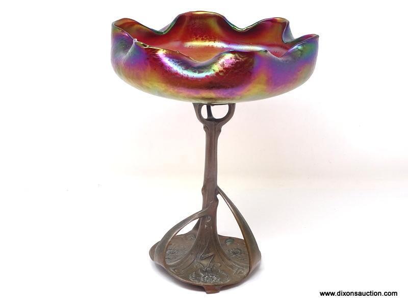 An Austrian, Loetz type tazza having a wide iridescent finished bowl with a gold center, changing