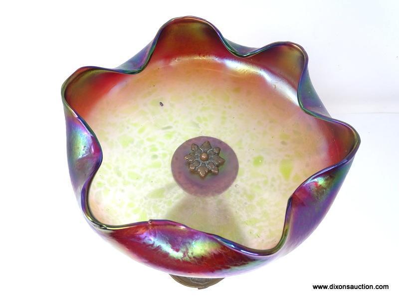 An Austrian, Loetz type tazza having a wide iridescent finished bowl with a gold center, changing