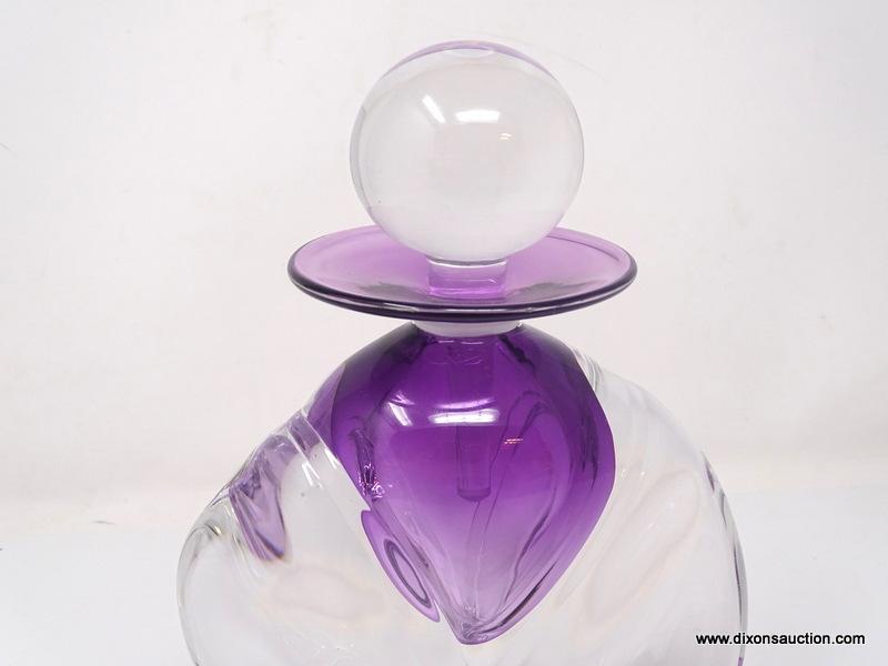 Extra large clear glass perfume bottle with amethyst colored vessel. Smooth flowing. heavy twisted