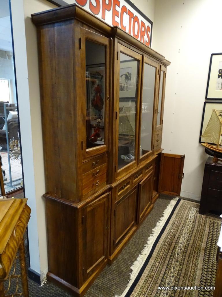 (R1) ANTIQUE 2 PIECE BRAZILIAN WOOD CHINA CABINET WITH WOODEN SHELVES AND BRASS PULLS. HAS KEY.
