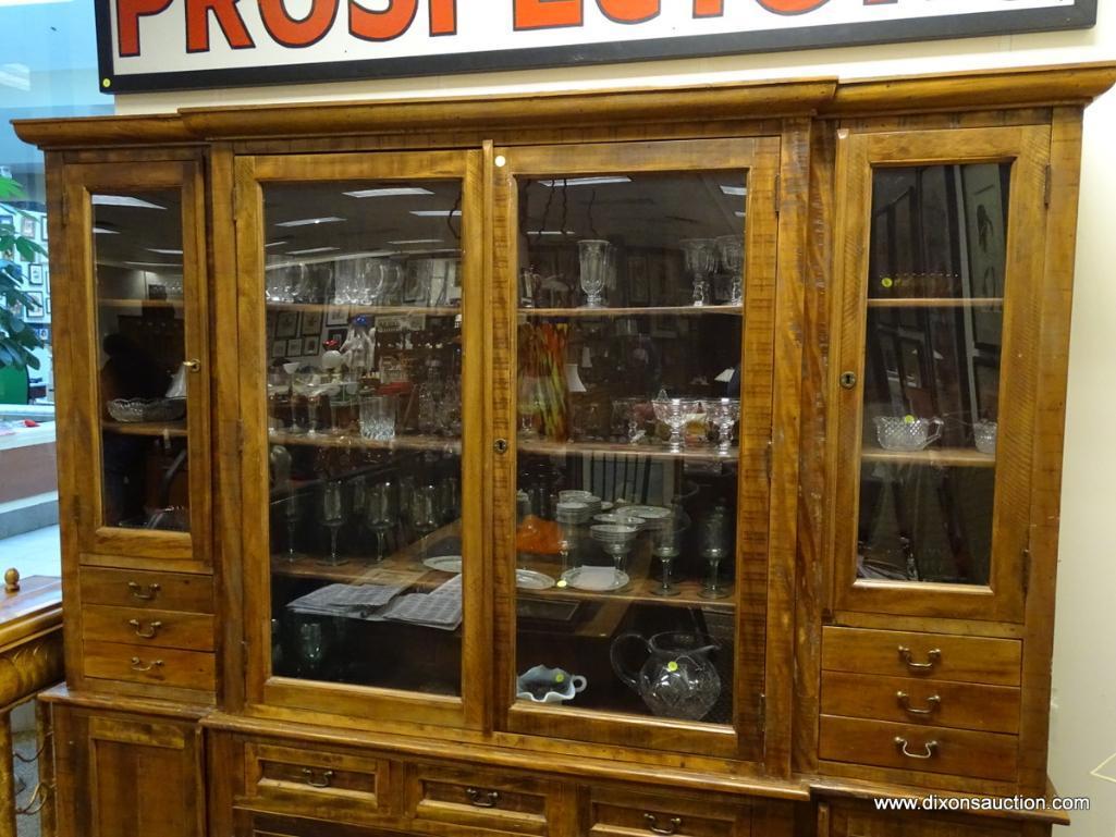 (R1) ANTIQUE 2 PIECE BRAZILIAN WOOD CHINA CABINET WITH WOODEN SHELVES AND BRASS PULLS. HAS KEY.