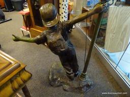 (WIN) BRONZE BOY LAMP POST STATUE. MEASURES APPROXIMATELY 44 IN X 88 IN. SIMILAR ITEMS RETAIL FOR