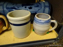 (R2) SHELF LOT OF ASSORTED ITEMS TO INCLUDE POTTERY PITCHERS, A SALT GLAZED CROCK, TERRA COTTA