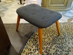 FRONT RIGHT - FOUR LEGGED UPHOLSTERED TOP FOOTSTOOL. APPROX 18 INCHES LONG, 14 INCHES TALL AND 13