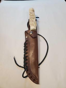Carved handle Bowie knife, Octopus carved, Comes with leather sheath, 5 1/2" Blade, 12 1/2" total