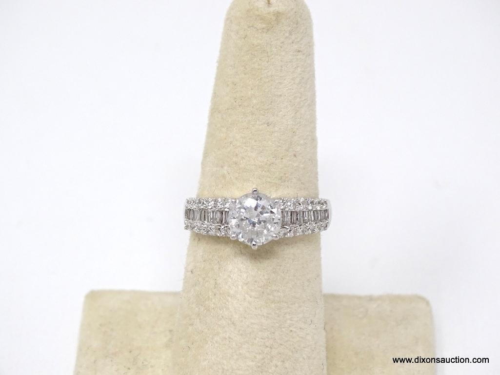 18K WHITE GOLD LADIES CAST DIAMOND UNITY RING.