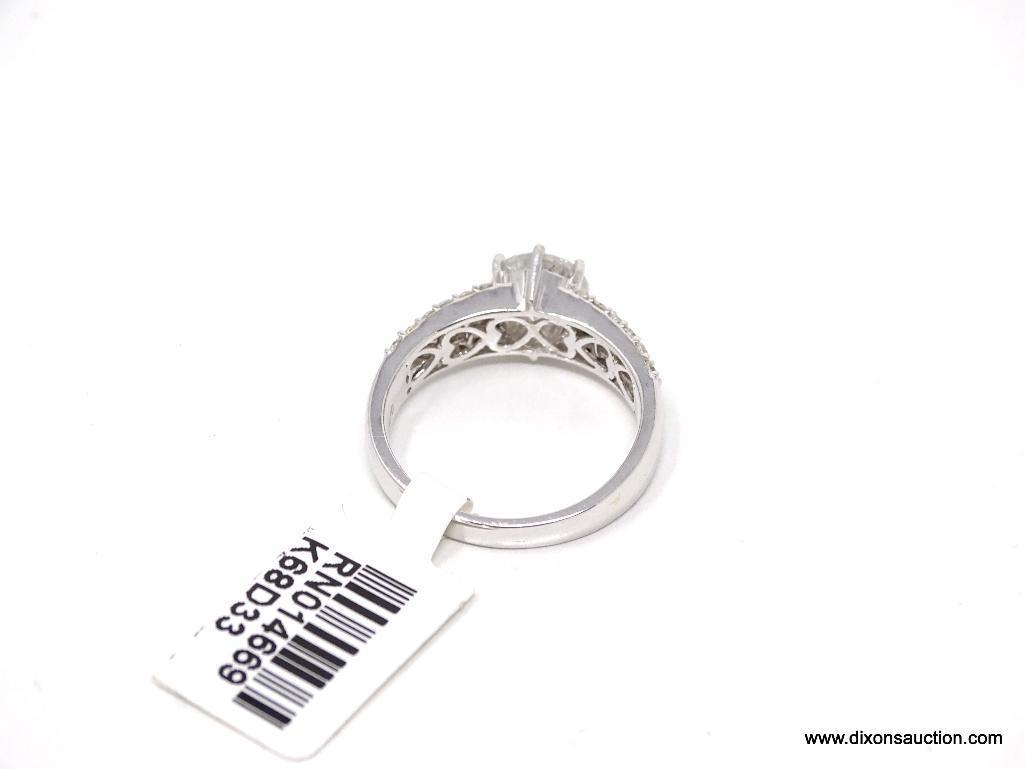 18K WHITE GOLD LADIES CAST DIAMOND UNITY RING.