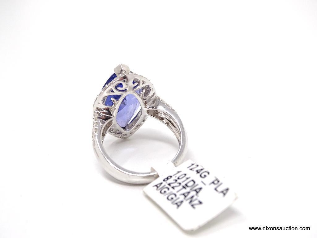 PLATINUM LADIES CAST TANZANITE AND DIAMOND RING.