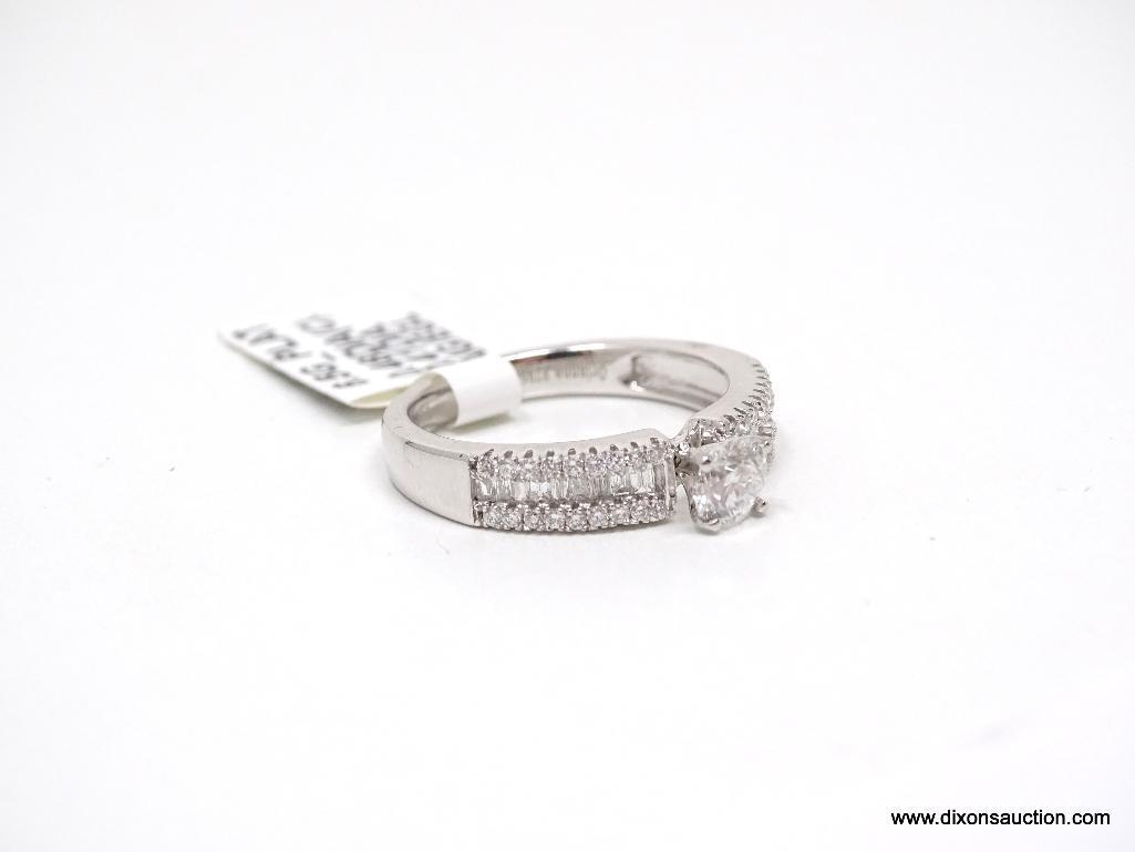 PLATINUM LADIES CAST & ASSEMBLED DIAMOND UNITY RING.