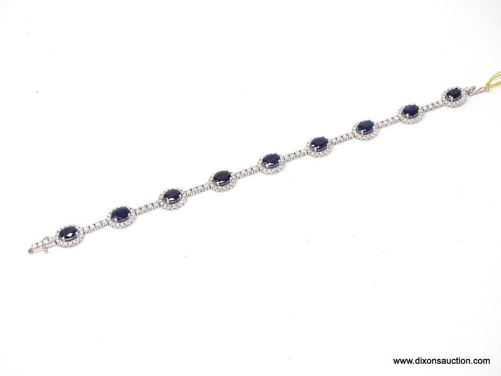 14K WHITE GOLD LADIES CUSTOM MADE DIAMOND & BLUE SAPPHIRE BRACELET.