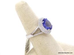 14K WHITE GOLD TANZANITE & DIAMOND RING.