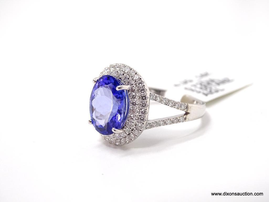 14K WHITE GOLD TANZANITE & DIAMOND RING.