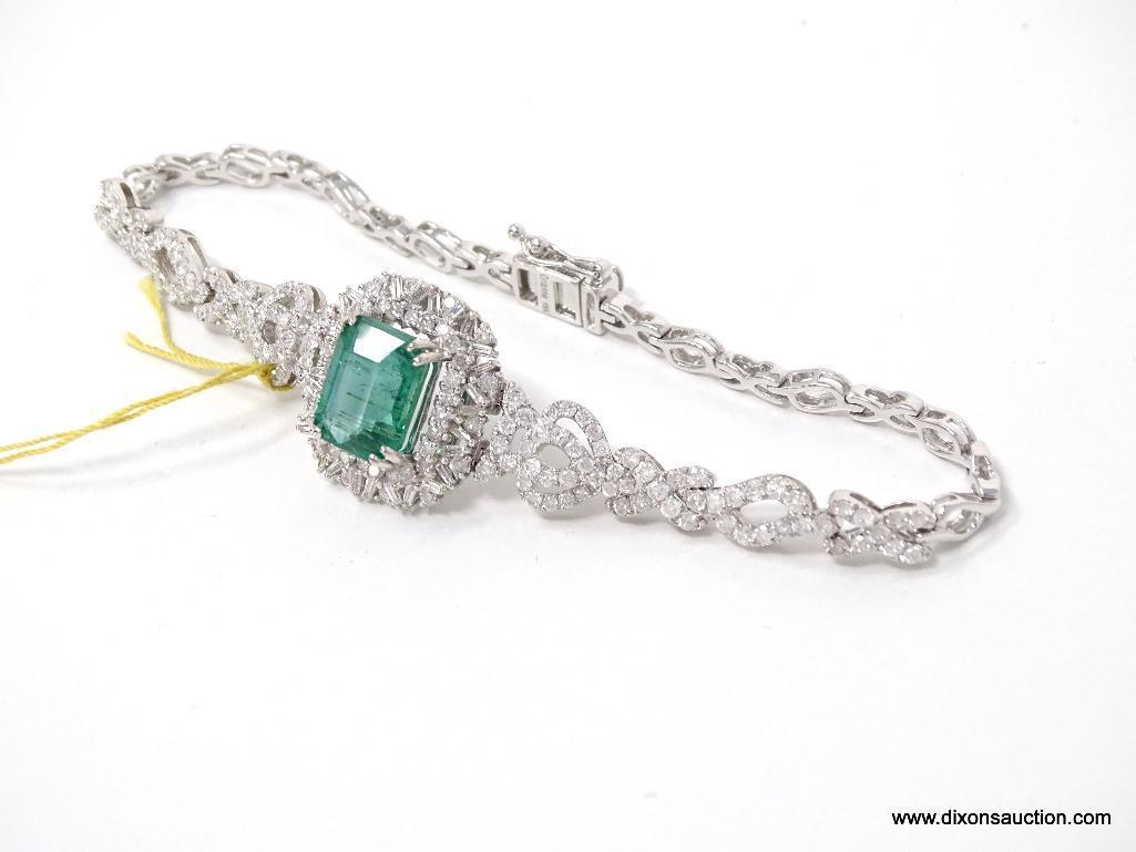 18K WHITE GOLD LADIES CAST & ASSEMBLED EMERALD & DIAMOND BRACELET.