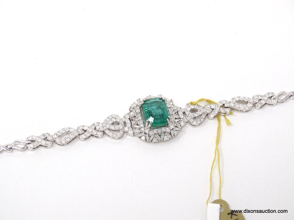 18K WHITE GOLD LADIES CAST & ASSEMBLED EMERALD & DIAMOND BRACELET.