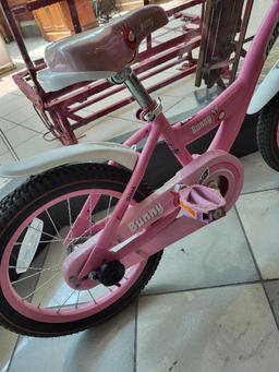 STITCH BUNNY GIRL'S BIKE 16 IN. COMES WITH TRAINING WHEELS. HAS A HORN AND BASKET. IS SOLD AS IS