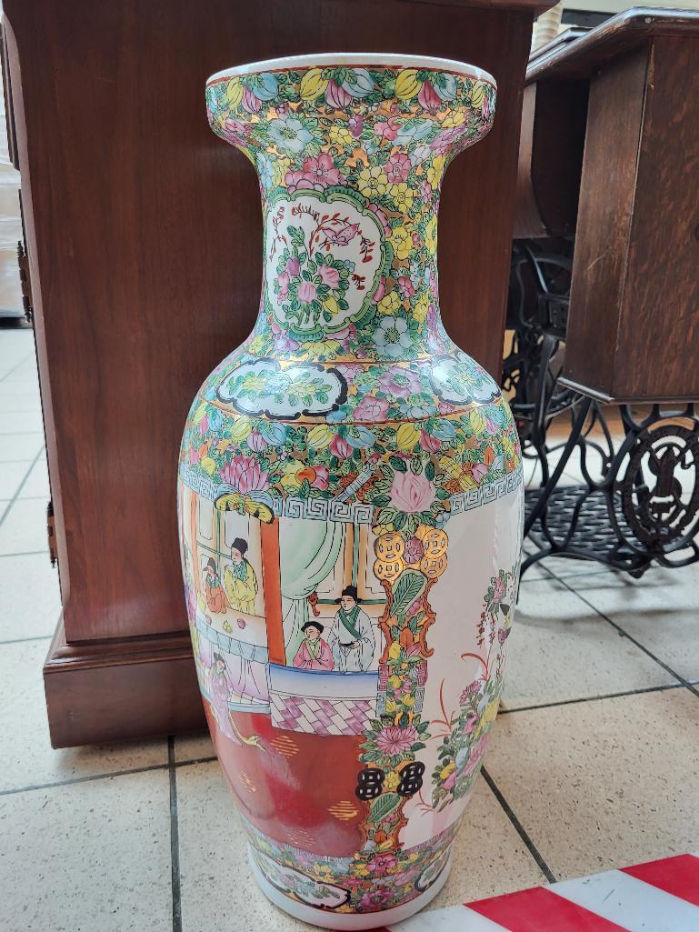 ORIENTAL CERAMIC VASE. HAS SEVERAL SCENES ON THE VASE. GOES GREAT WITH ANY D?COR. MEASURES APPROX 24