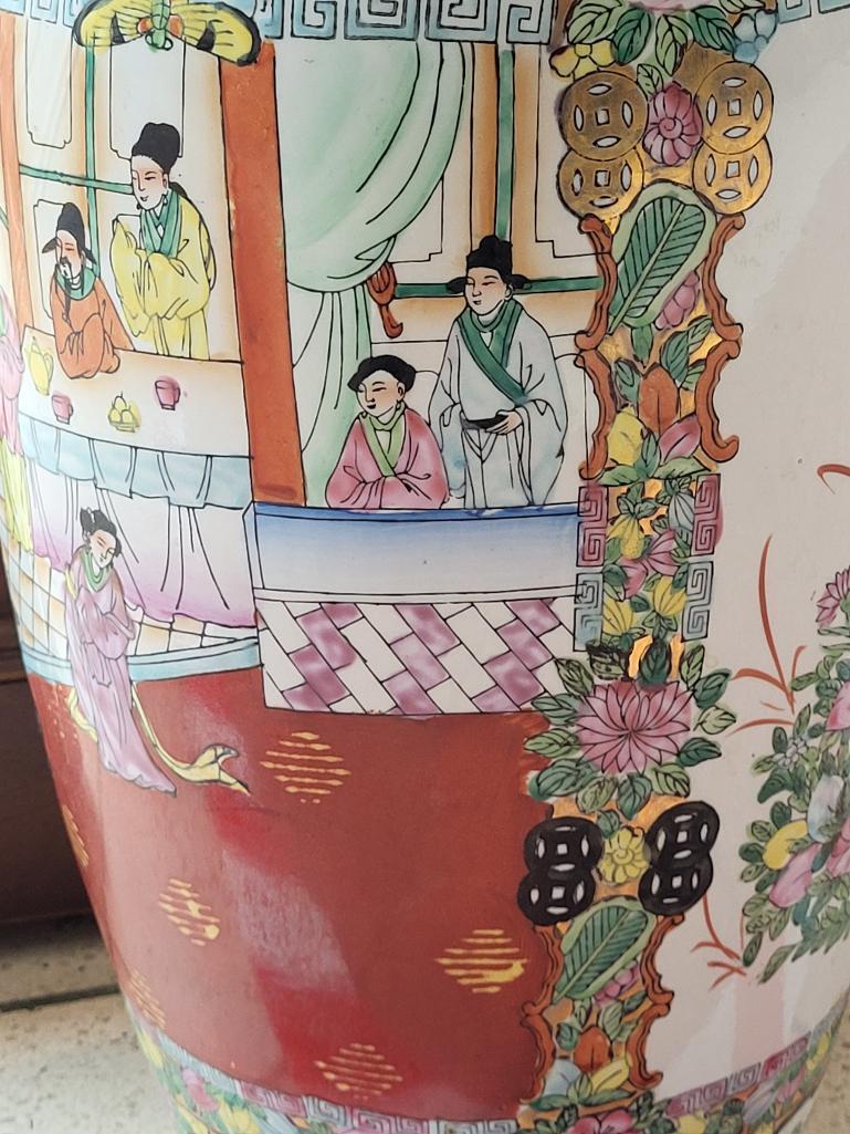 ORIENTAL CERAMIC VASE. HAS SEVERAL SCENES ON THE VASE. GOES GREAT WITH ANY D?COR. MEASURES APPROX 24