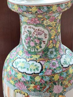 ORIENTAL CERAMIC VASE. HAS SEVERAL SCENES ON THE VASE. GOES GREAT WITH ANY D?COR. MEASURES APPROX 24