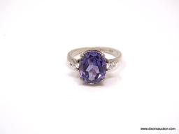 .925 STERLING SILVER RING WITH PRONG SET SYNTHETIC OVAL CUT COLOR CHANGE ALEXANDRITE & A ROUND CUT