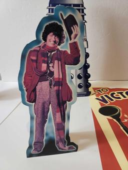 LOT OF (3) DOCTOR WHO ITEMS. INCLUDES A 10" TALL MINIATURE CARDBOARD CUT OUT OF TOM BAKER THE 4TH