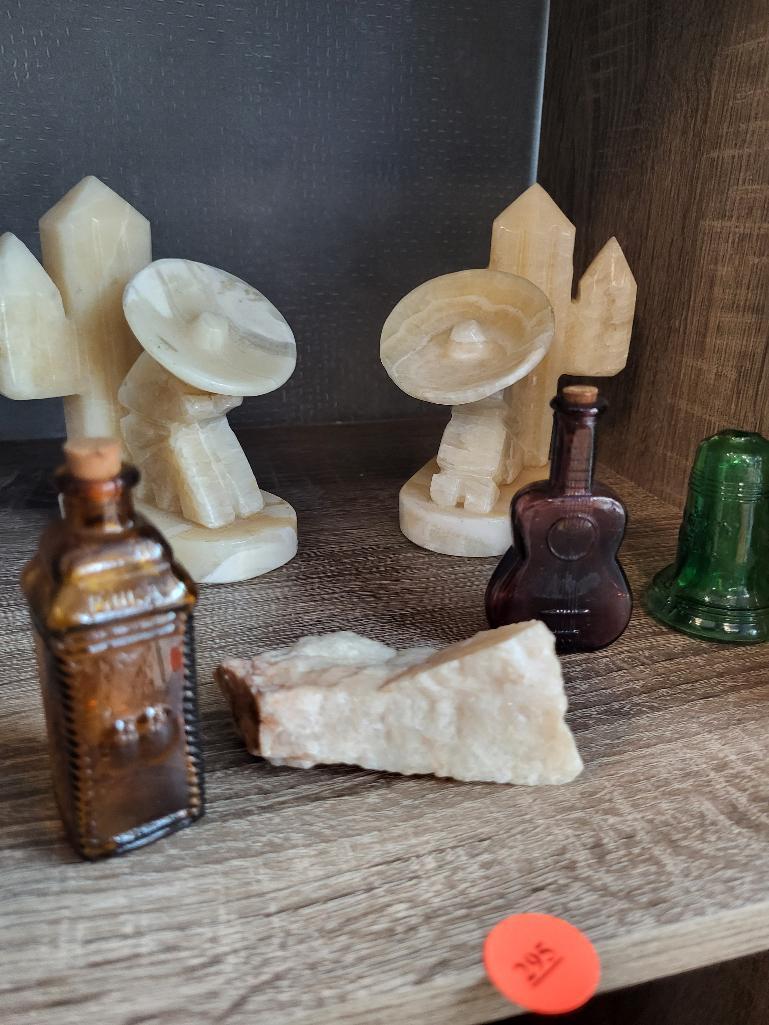 CARVED VINTAGE ONYX SLEEPING AMIGO AND CACTI BOOKENDS, MINI GLASS LIBERTY BELL, DECANTER AND VIOLIN.